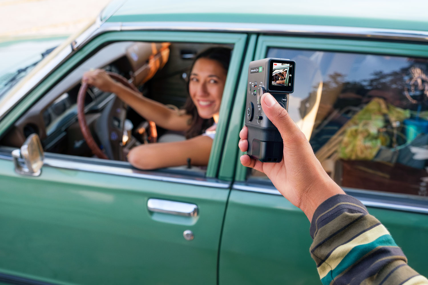 Instax Mini Evo Cinema foto maken van auto
