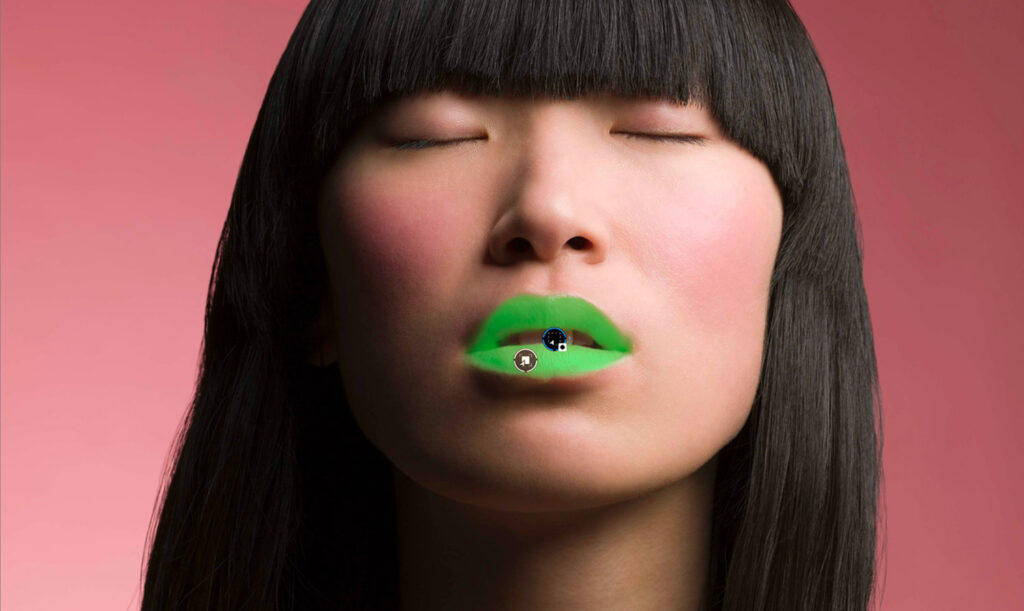 Gezichtssegmentatie in DxO PhotoLab 10 die de lippen van een portret groen markeert